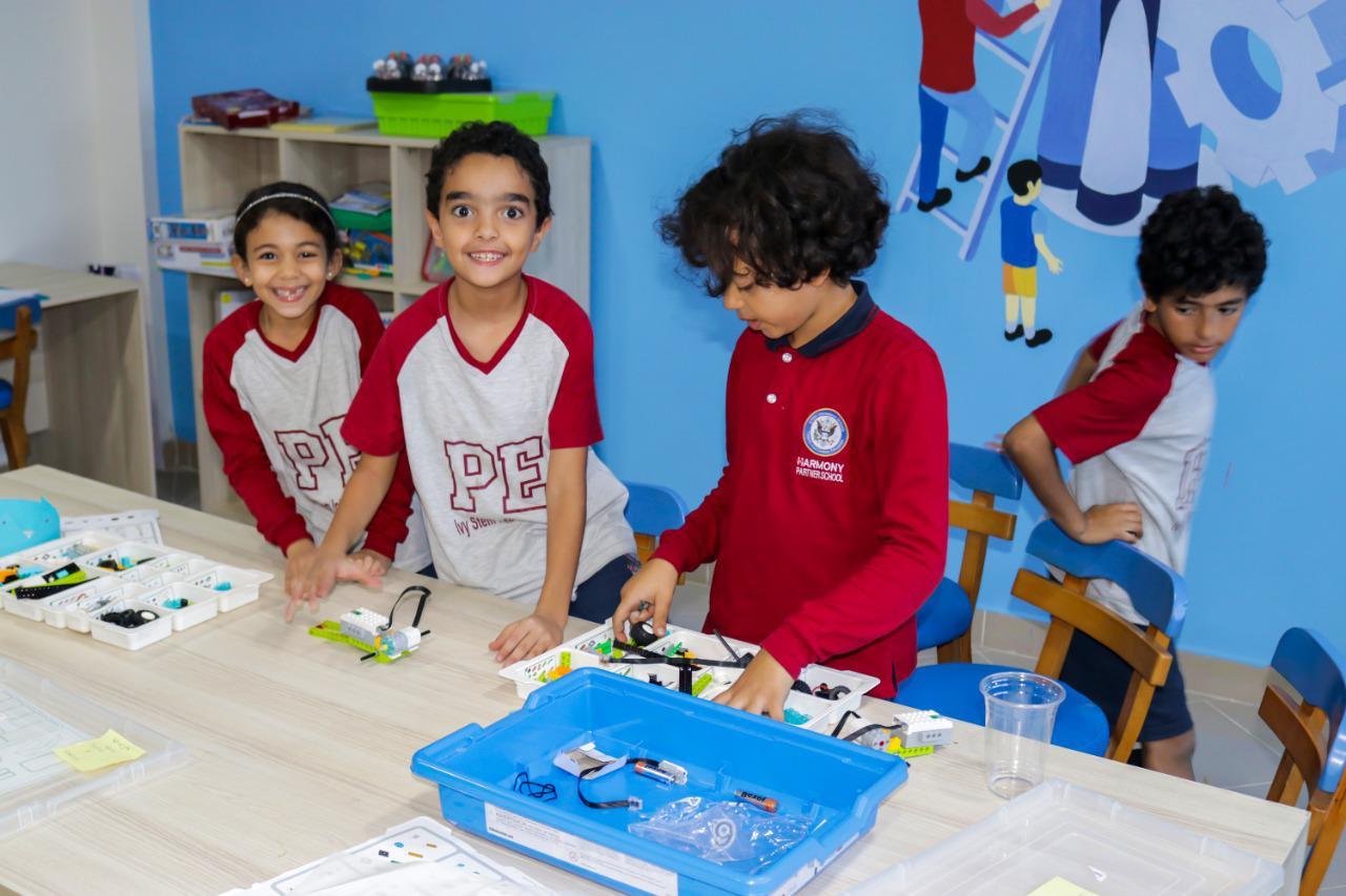 Group of students engaged in educational STEM activities at IVY STEM International School